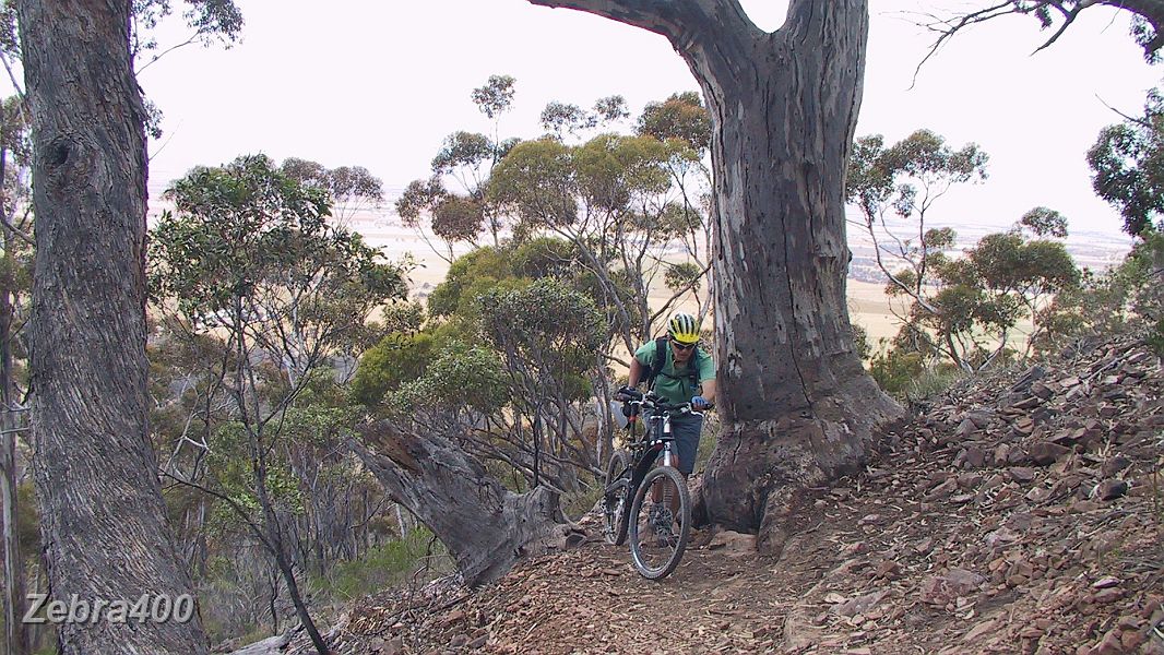 26-Heidi encounters a rocky section while MTBing.JPG